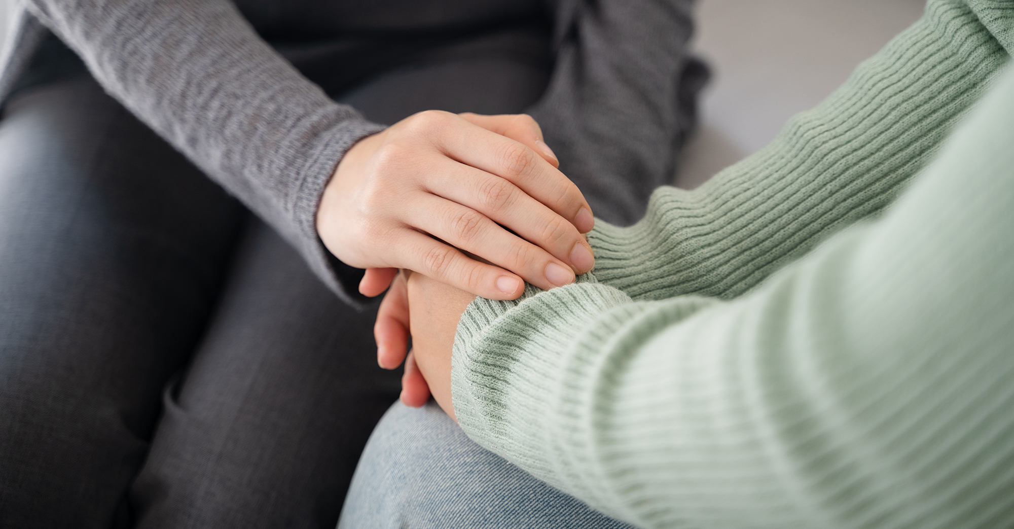 Holding hands in support